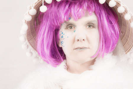 Ethereal female circus style character on white backgroundの写真素材