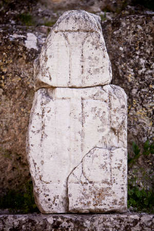 Cross carved in stone at the ruins of Laodiceaの写真素材