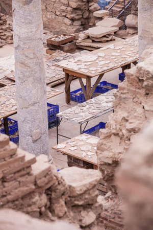 Tables with ceramic shards at archeological site in Turkeyの写真素材