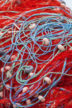 Colorful fishing nets and floats at seaside near Troy in Turkeyの写真素材