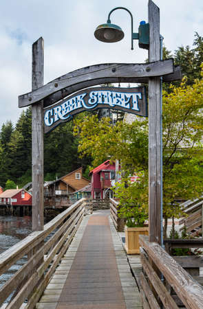 KETCHIKAN, AK - MAY 15: Entry sign to walkway and historic buildings on Creek Street on May 15, 2016 in Ketchikan, AK.のeditorial素材