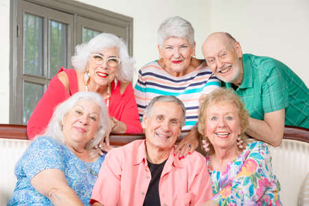 Portrait of six happy senior friends smilingの写真素材