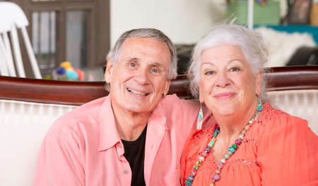 Content senior man and woman at homeの写真素材