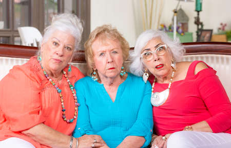 Three skeptical or shocked senior womenの写真素材