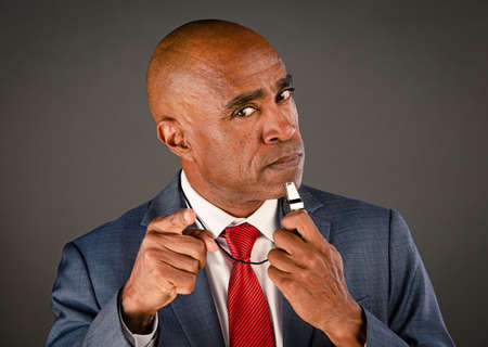 Angry male corporate or government whistleblower pointingの写真素材