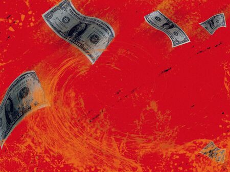 The money is burning, it is an abstract textured image of banknotes flying with wind and falling into fireの写真素材