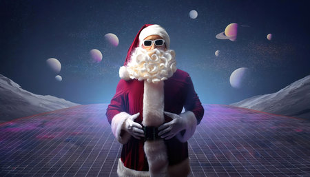 Santa Claus with bag of gifts on his back in futuristic space backgroundの写真素材
