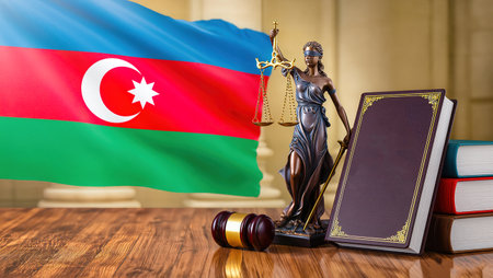 Judges gavel, scales of justice, books and flag of Azerbaijanの写真素材