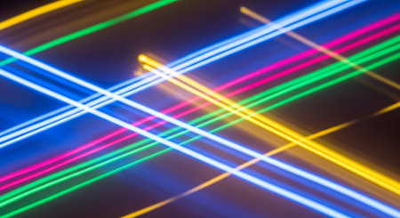 Neon lines abstract background. Long exposure photo of colorful neon lights.の素材