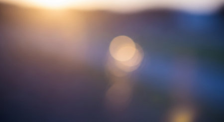 Blurred bokeh of sunset over the sea. Abstract background.の素材
