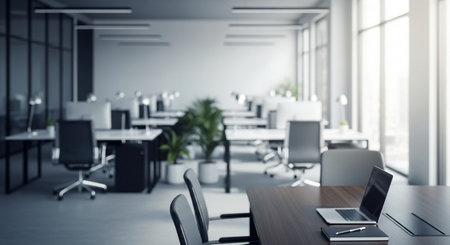 Interior of modern open space office with white walls, concrete floor, rows of computer tables and gray chairs. 3d renderingの素材