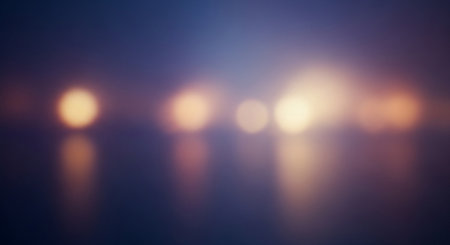 Abstract background with bokeh defocused lights and reflection on waterの素材