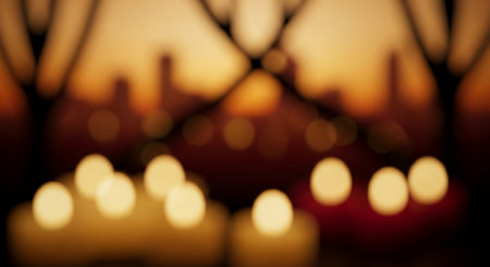 Burning candles in the church at sunset. Abstract blurred background.の素材