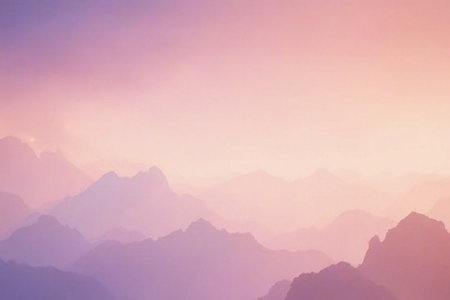 Mountains in fog at sunrise. Landscape with mountains in fog.の素材