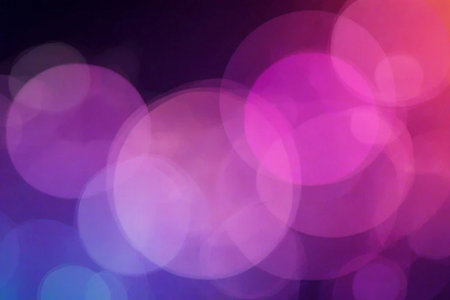 Abstract circular colorful bokeh from the party light on black backgroundの素材