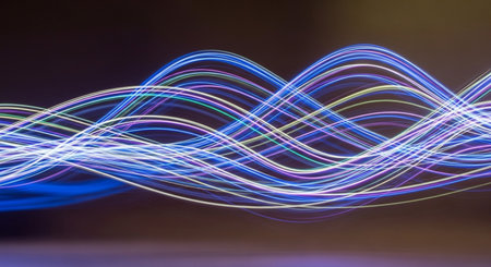 Abstract light lines background. Long exposure photograph. Blurred motion.の素材