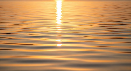sunset in the sea, close-up of water surface textureの素材