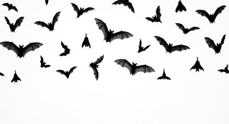 Halloween concept. Flying bats silhouettes isolated on white background.の素材
