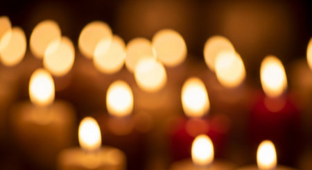 Burning candles in the dark, shallow depth of field. Abstract background.の素材