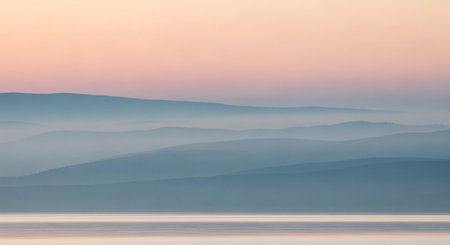 Beautiful sunrise over the lake in the mountains. Long exposure.の素材