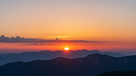 Beautiful sunset in the mountains. Panoramic view of the mountains.の素材