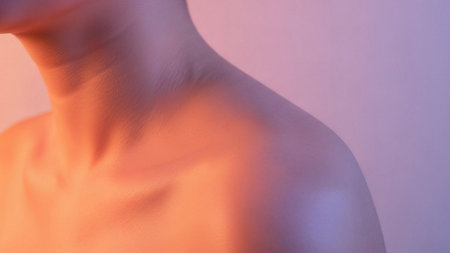 Close up of female body part in neon light. Beautiful female body.の素材