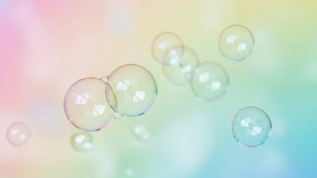 Soap bubbles on rainbow background. Abstract background with soap bubbles.の素材