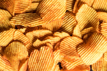 Potato chips background. Close-up of potato chips background.の写真素材