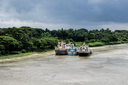 Cargo ships on Voyrob River near Khulna Bangladesh, Ships in the river of Voyrob from Khulna,の写真素材