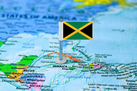 Jamaica flag on a map. Close-up image.の写真素材