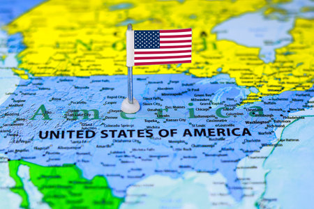 United States of America on the map with a flag pin, travel concept