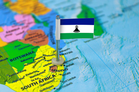 Lesotho Flag Over World Map, Closeup view