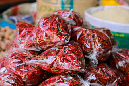 Red chili in a plastic bag on the street market in Jashore, Bangladeshの写真素材