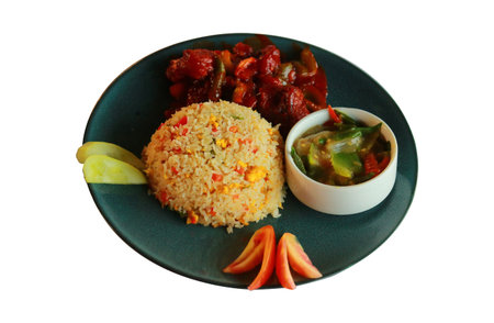 Delicious Indo-Chinese Fried Rice with Spicy Chili Chicken and Vegetable Curry Platter isolated on a transparent backgroundの写真素材