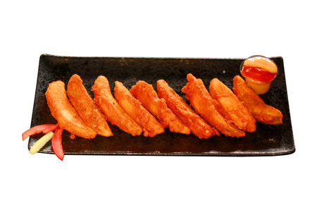 Crispy Potato Wedges or Chicken Strips with Dipping Sauceの写真素材