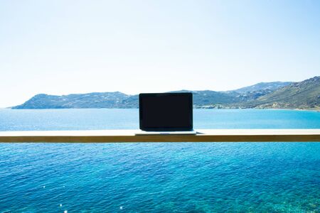 Laptop Computer Mock Up with Skiathos on the Backgroundの写真素材