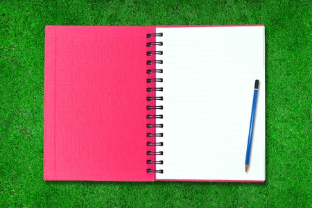 note book and pencilの写真素材