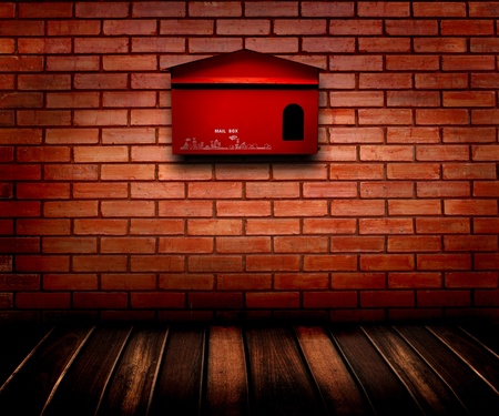 mail box on brick wall and wooden floor の写真素材