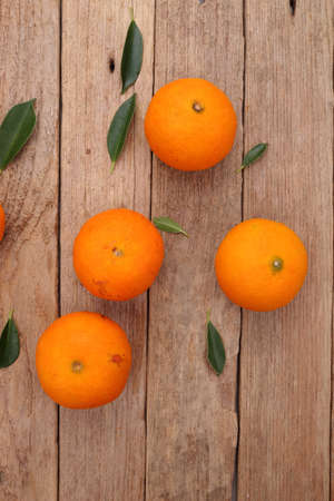 Ornage fruit on wooden background