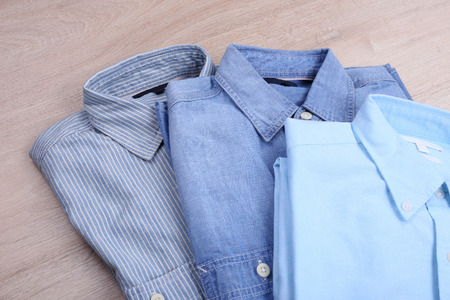 Casual shirt on wooden backgroundの写真素材