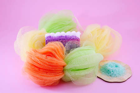 Colorful bath sponge with peeling soap and sea saltの写真素材