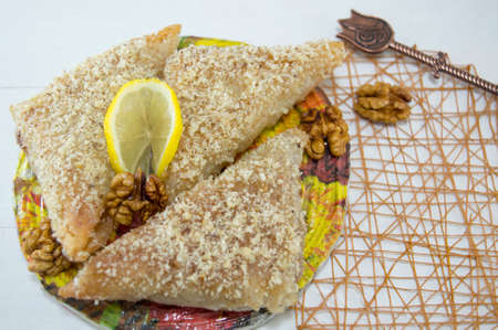 Greek baklava and Turkish coffee served on a tableの写真素材