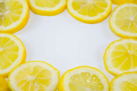 Lemon slices in a circle with copyspace in the middleの写真素材
