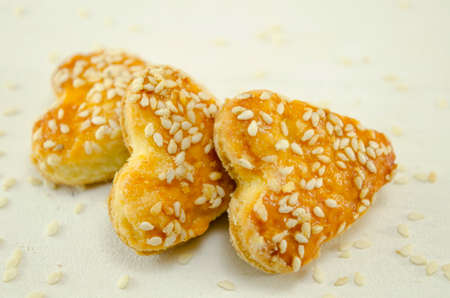 Salty heart shaped sesame crackersの写真素材