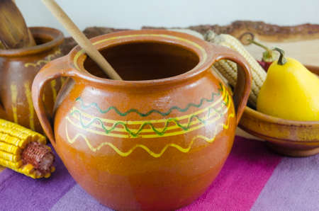 Vintage clay pottery in a still life arrangementの写真素材