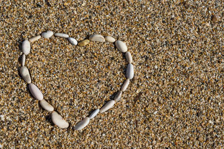 Hearth shaped rocks on a roky beach