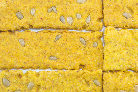 Crunchy oat thins  forming pattern on white