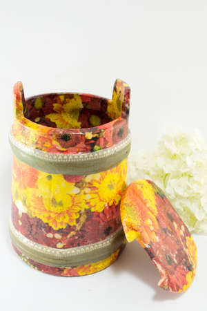 Decoupage decorated flower pattern jar on white background. Decoupage decoratoinの写真素材