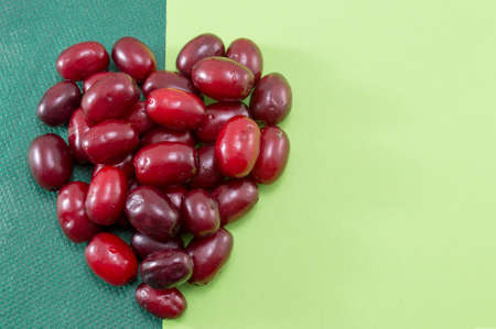 Hearth shape made from fresh cornel fruitの写真素材