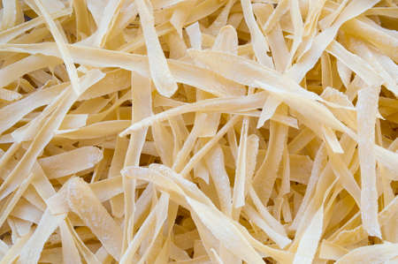 Homemade pasta drying on the balconyの写真素材